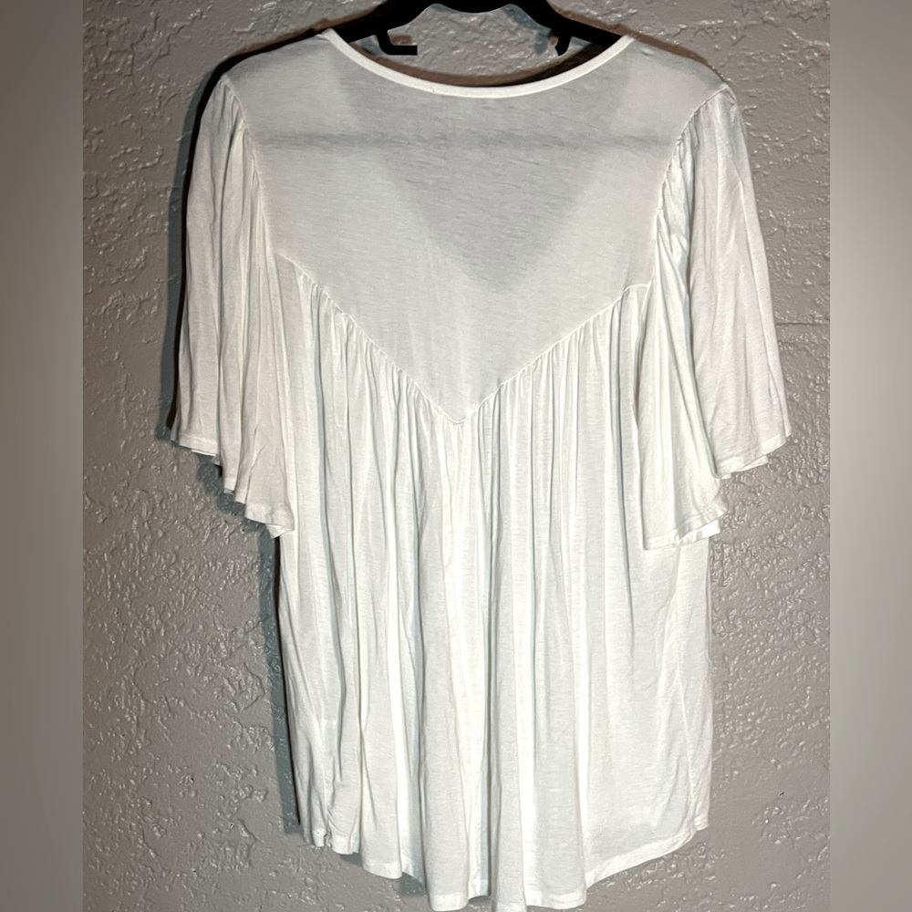 Anthropologie white tee with flutter sleeve and back, size S.